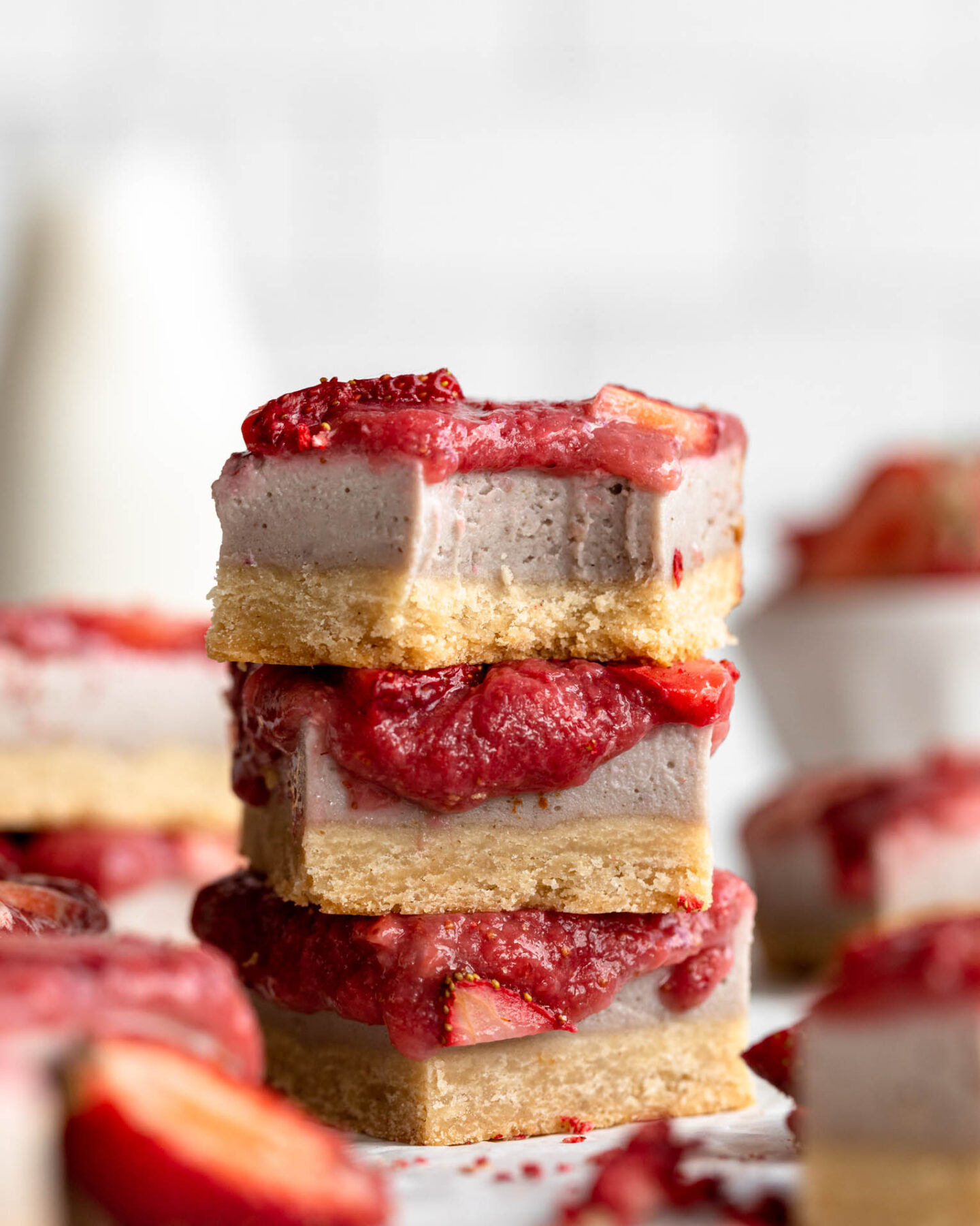Stack of healthy Strawberry Cheesecake Bars.