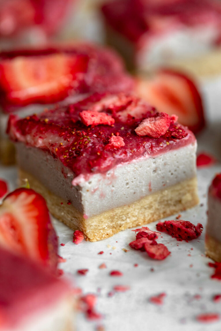 Angled close up of Strawberry Cheesecake Bars.