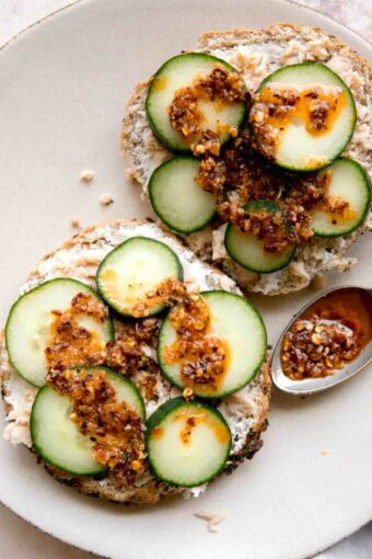 Chili Crunch Salmon Cream Cheese Bagels on a plate.