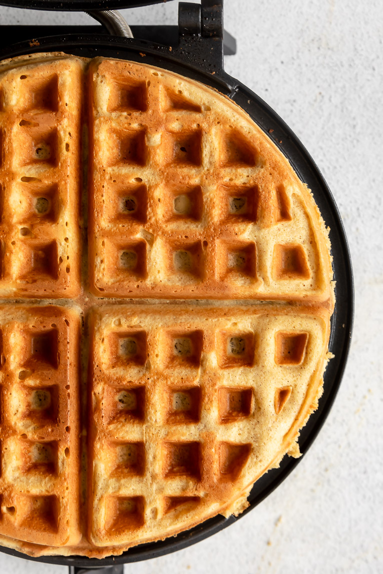 Almond Flour Waffles in a waffle maker.