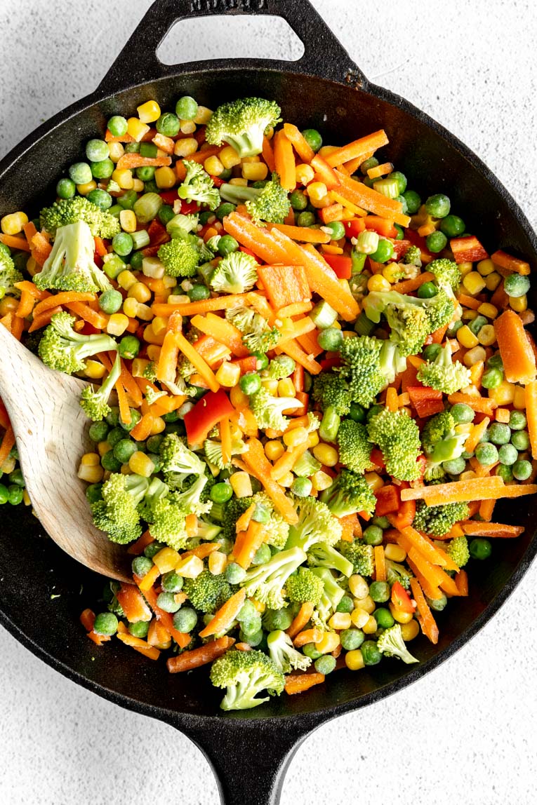 Veggies sauteed in a pan.