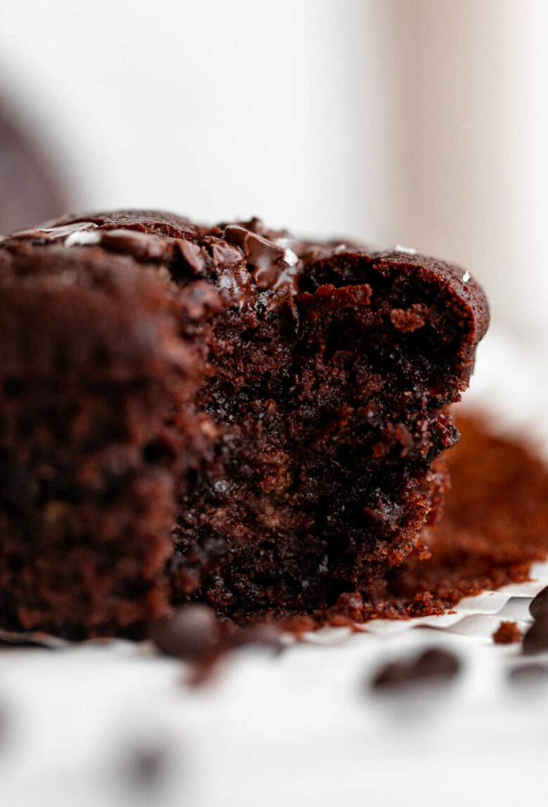 Chocolate Zucchini Muffin with bite taken out.