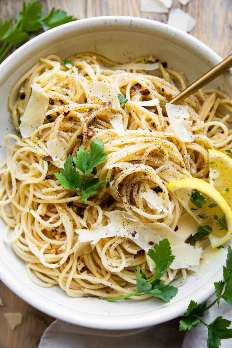 Creamy Lemon Garlic Pasta recipe in a bowl with parsley.