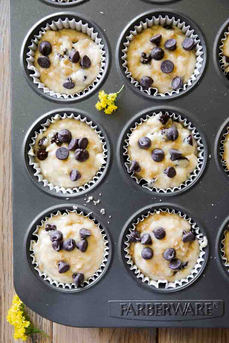 Healthy chocolate chip muffins batter in a cupcake pan.