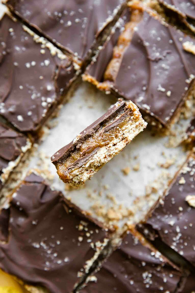 Close up of a Homemade Date Twix Bar with layers.