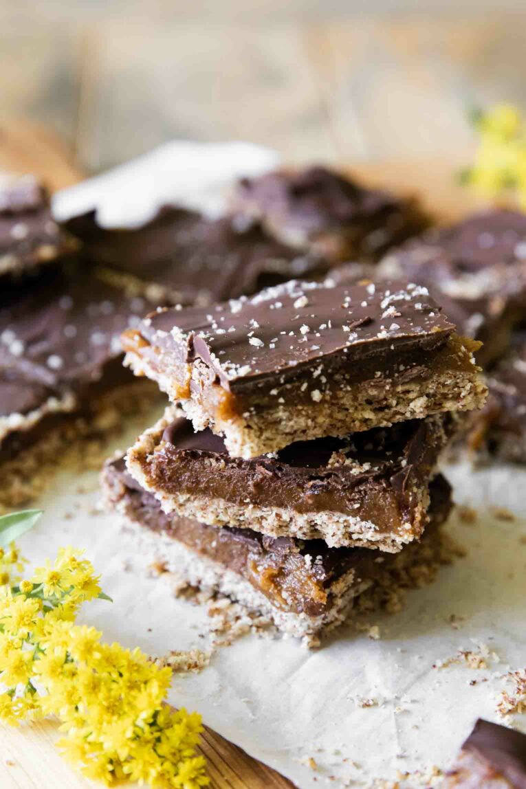 Homemade Date Twix Bars stacked healthy candy recipe.