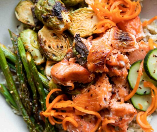 Hot Honey Salmon Bowl recipe with a fork.