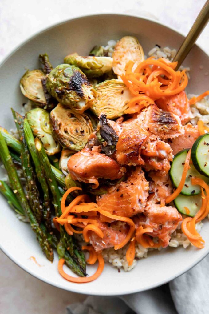 Hot Honey Salmon Bowl recipe with a fork.