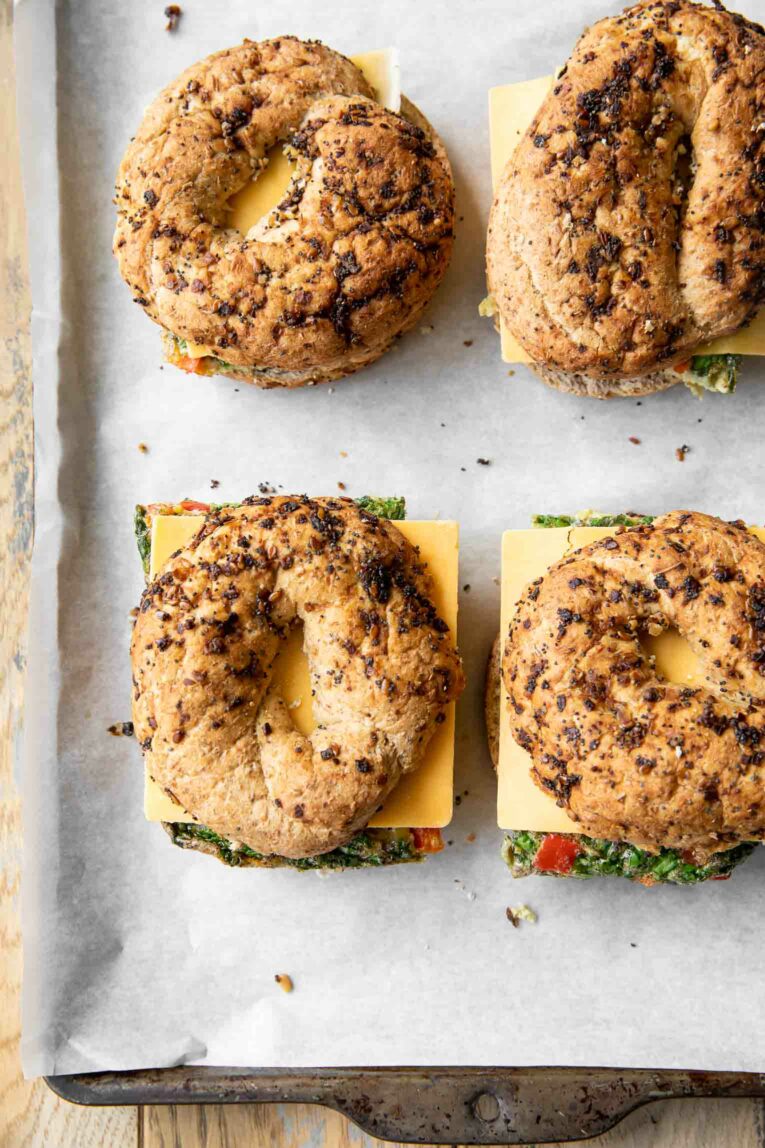 Meal Prep Breakfast Egg Bagels on parchment paper.