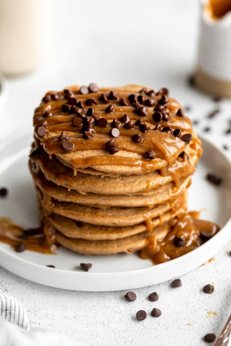 Angled photo of Mocha Protein Peanut Butter Pancakes on a plate.
