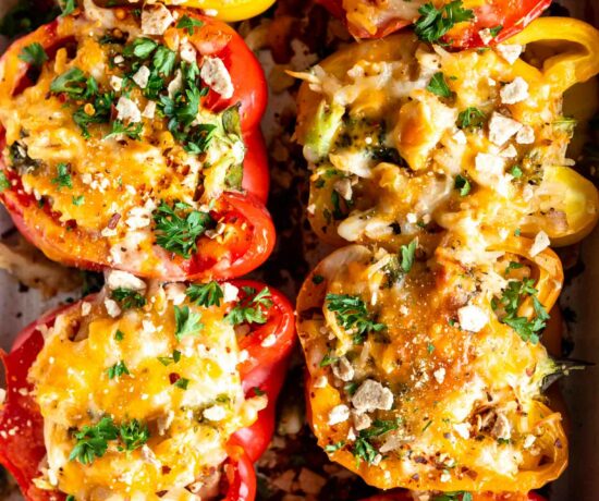Top shot photo of Chicken & Rice Stuffed Peppers in a baking dish.