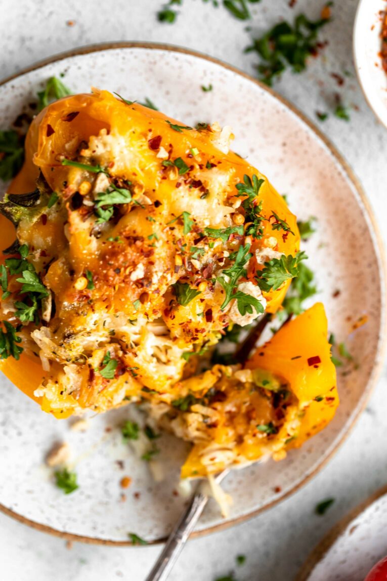Yellow bell pepper stuffed with chicken and rice.