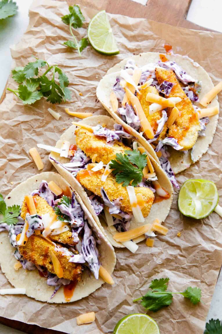 3 Air Fryer Fish Tacos recipe on parchment paper.