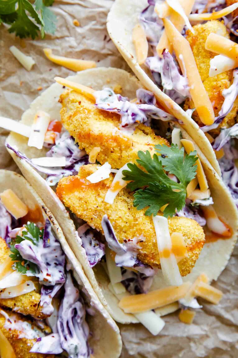 Close up of Crispy Air Fryer Fish Taco with breaded cod and cilantro.