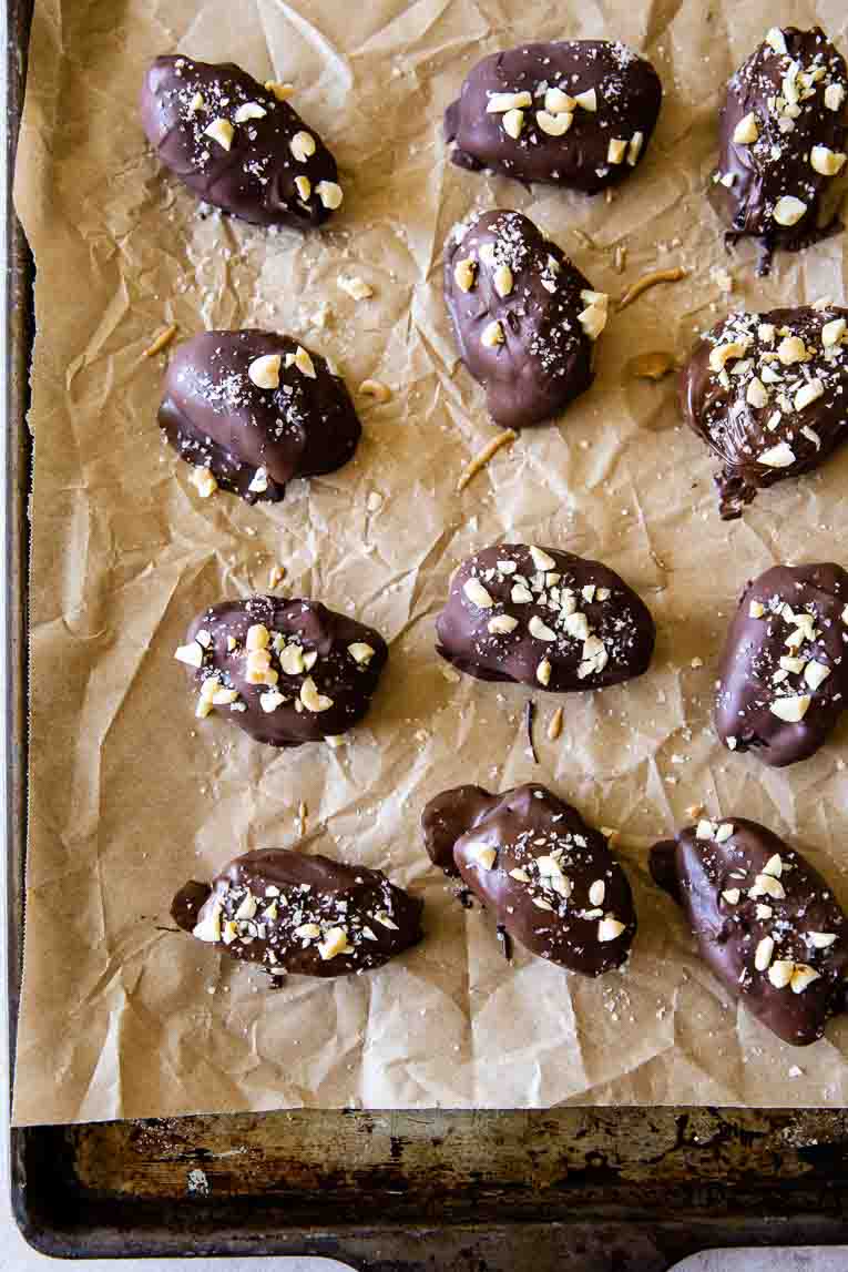 Date Snickers (Peanut Butter Yogurt Dates) on a baking sheet.