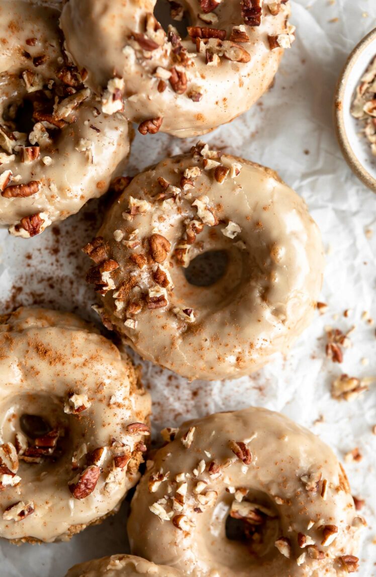 Gluten-free donuts with maple glaze and pecans.