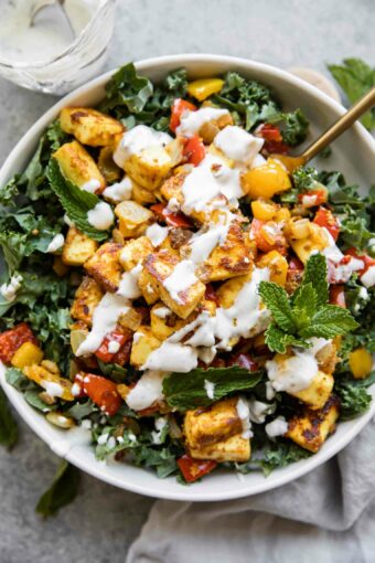 Tandoori Paneer Salad with a fork.