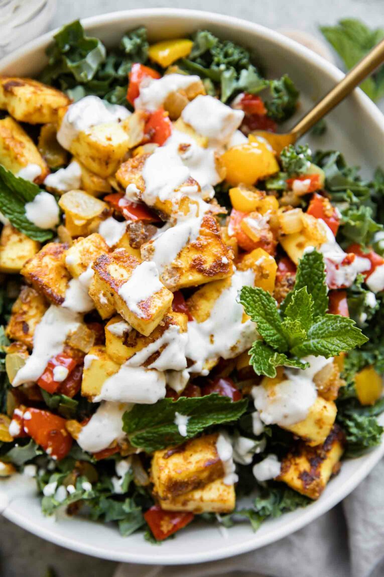 Close up of Tandoori Paneer Salad with mint raiti.