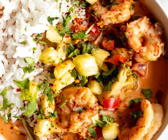 Close up of Thai-Inspired Coconut Curry Shrimp with rice.