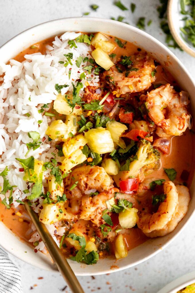 Close up of Thai-Inspired Coconut Curry Shrimp with rice.