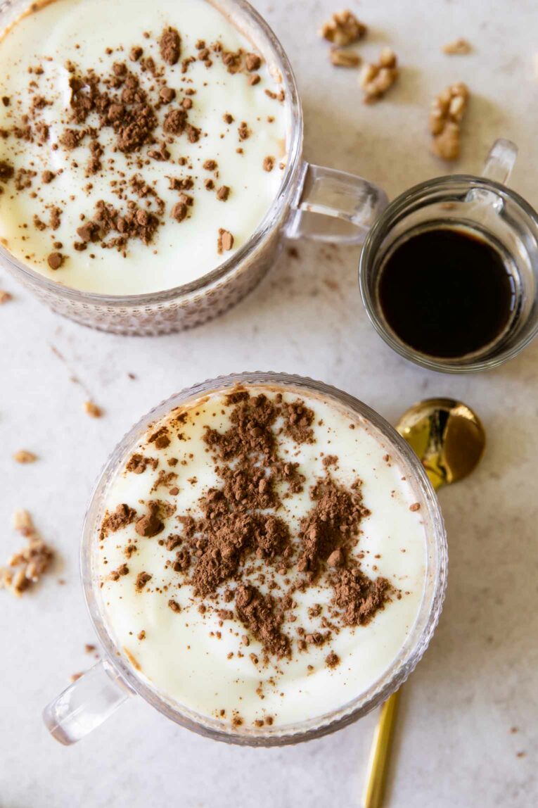 Two jars of Tiramisu Overnight Oats with a shot of espresso.