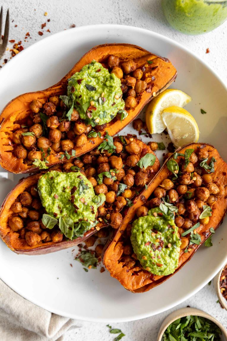 Top shot photo of baked sweet potatoes with chickpeas and broccoli pesto recipe