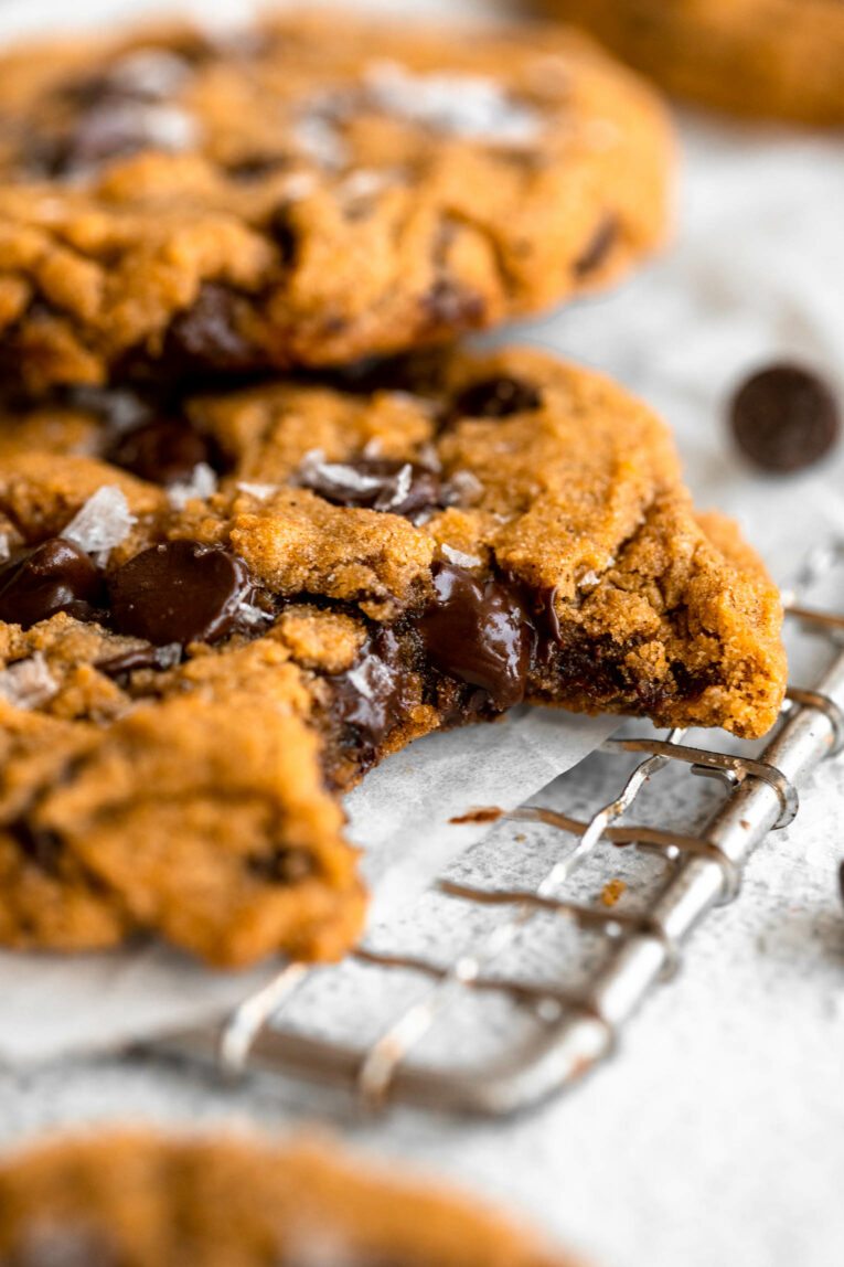 Angled photo of Gluten-Free Pumpkin Chocolate Chip Cookie with bite taken out.