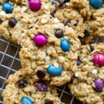 Gluten-Free Monster Cookies on a wire rack.