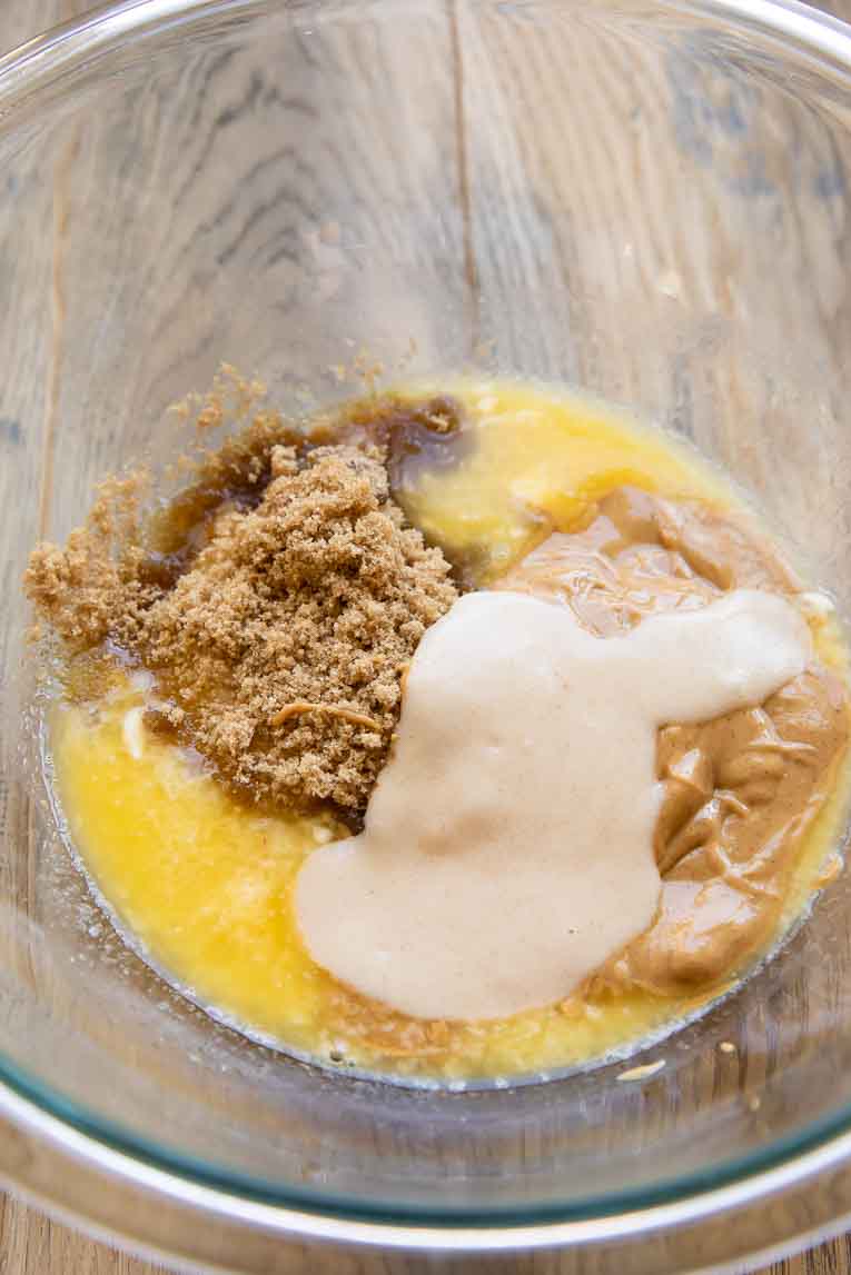 Liquid ingredients in a large mixing bowl for gluten-free cookies.