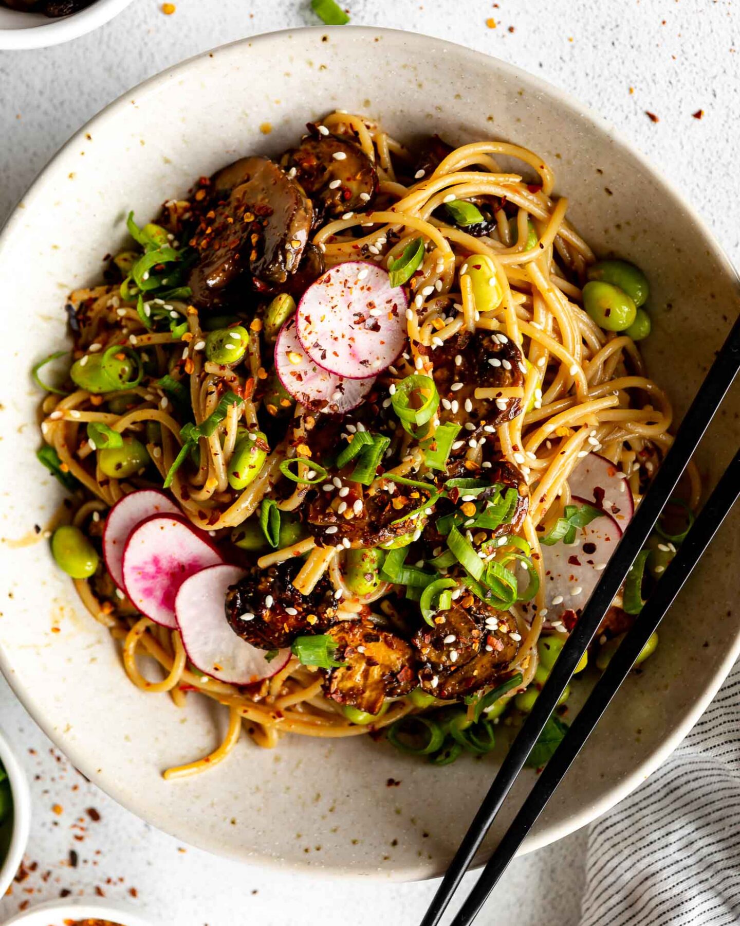 Miso Noodle Bowls with Roasted Mushrooms in a bowl with toppings.