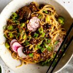 Miso Noodle Bowls with Roasted Mushrooms in a bowl with toppings.