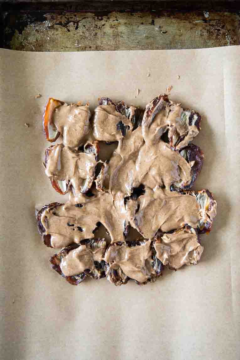 Dates topped with creamy almond or peanut butter.