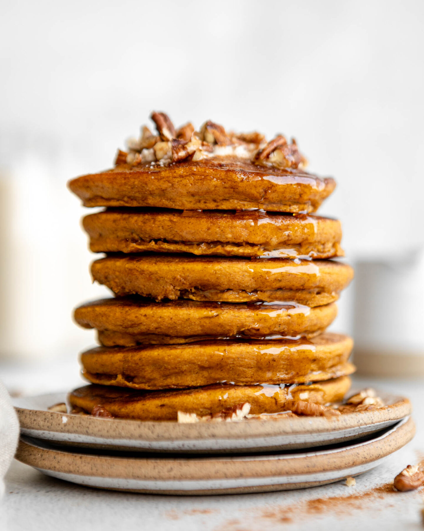 Stack of Pumpkin Oat Pancakes on a plate.