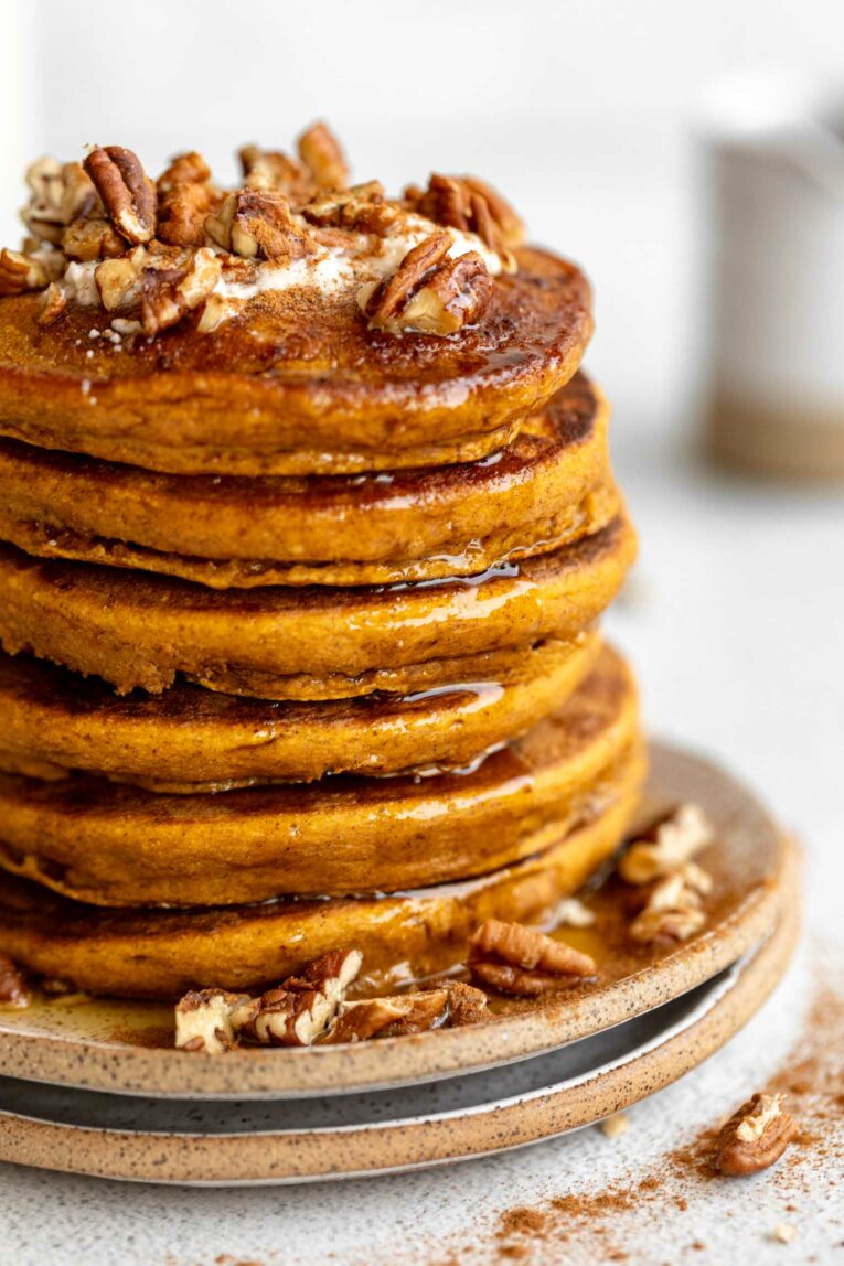 Close up of Pumpkin oat pancakes stacked.