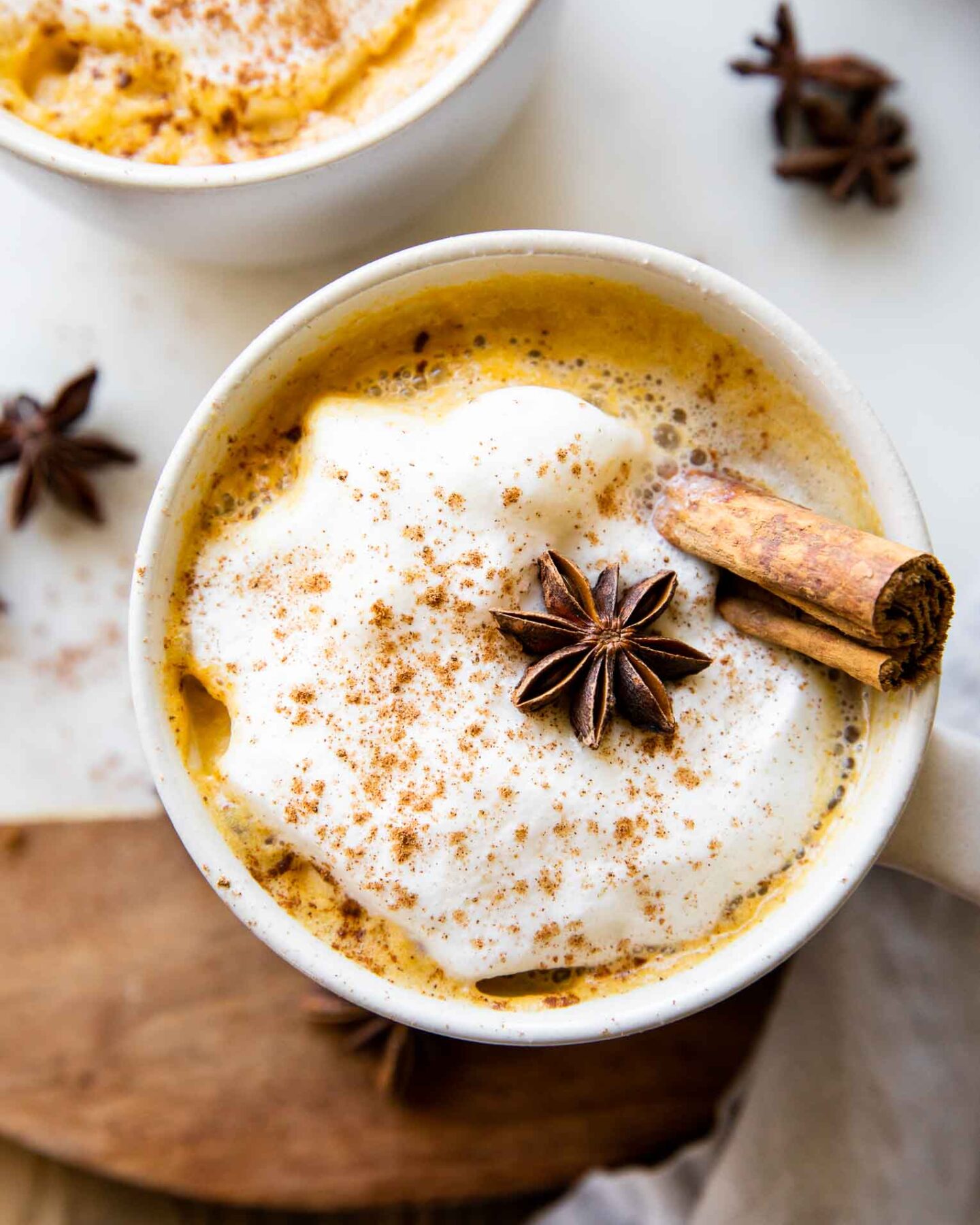 Top shot photo of Pumpkin Spice Chai Latte with anise and cinnamon.
