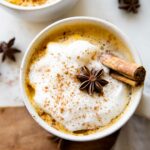 Top shot photo of Pumpkin Spice Chai Latte with anise and cinnamon.