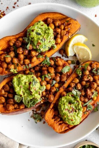 Top shot photo of baked sweet potatoes with chickpeas and broccoli pesto recipe