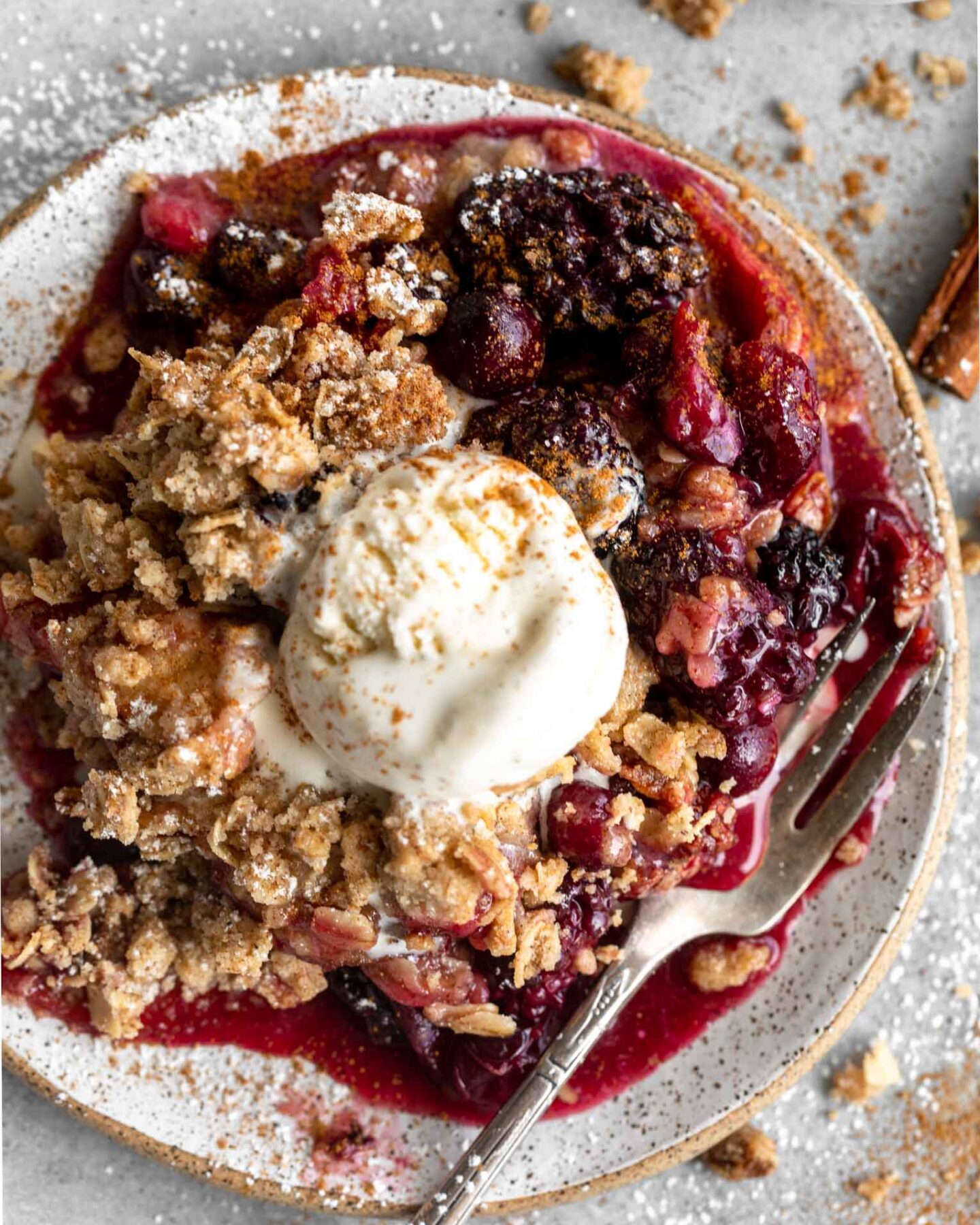 Apple Blackberry Cranberry Crumble on a plate.