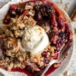 Apple Blackberry Cranberry Crumble on a plate.