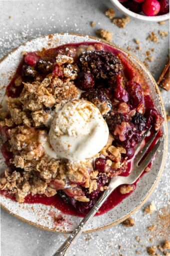 Apple Blackberry Cranberry Crumble on a plate.