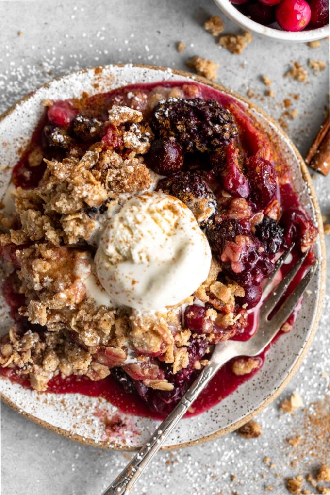 Apple Blackberry Cranberry Crumble on a plate.