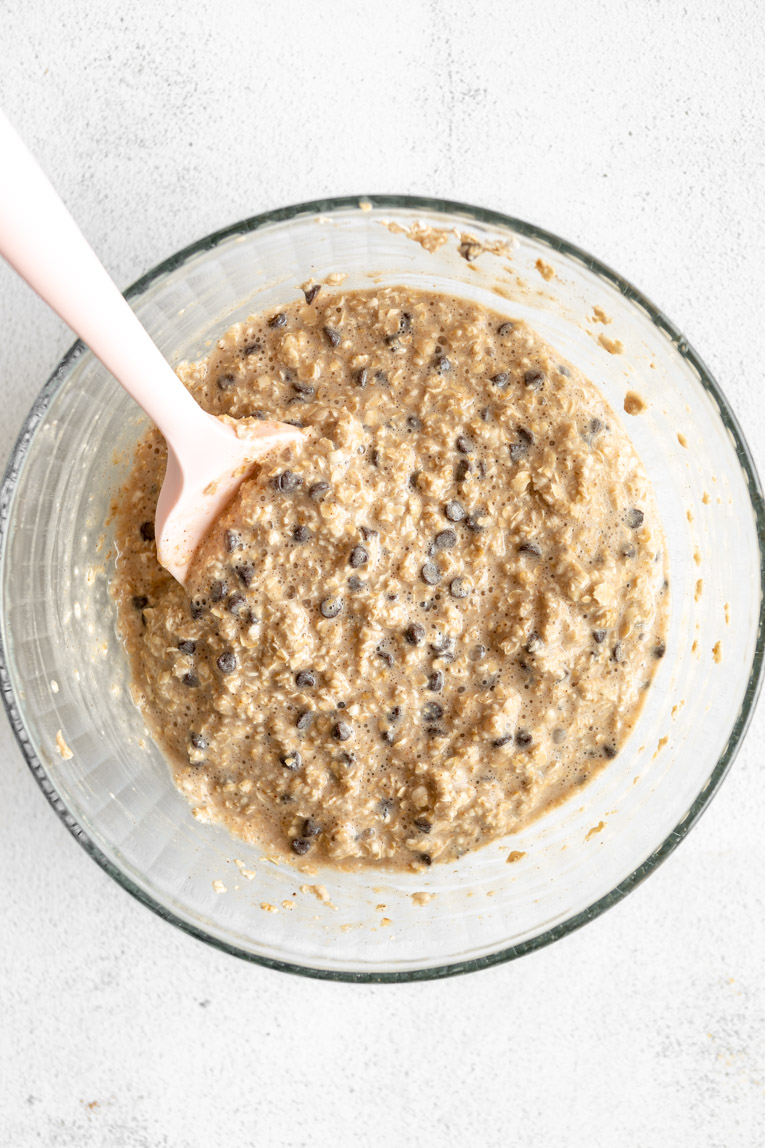 Banana Chocolate Chip Baked Oatmeal Cups batter in a mixing bowl.