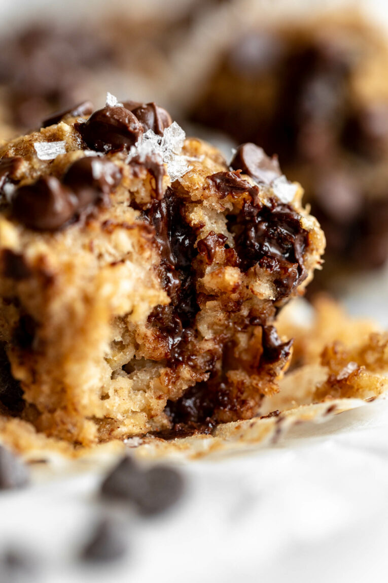 Close up of Banana Chocolate Chip Baked Oatmeal Cups with bite taken out.