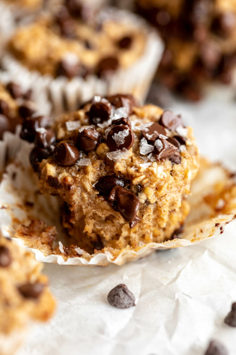 Across photo of Banana Chocolate Chip Baked Oatmeal Cups in cupcake liner.