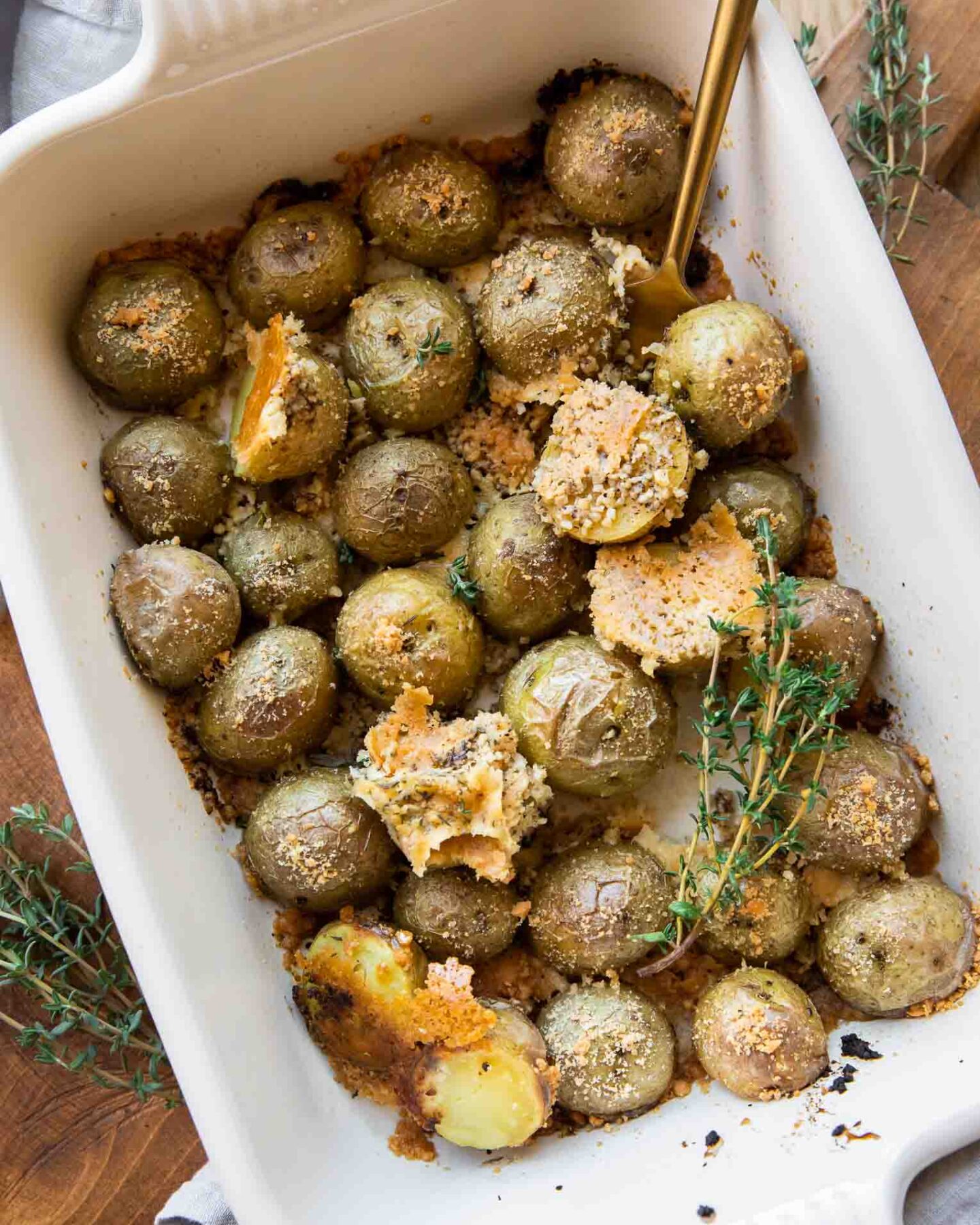 Crispy Garlic Parmesan Crusted Potatoes recipe in a baking dish.