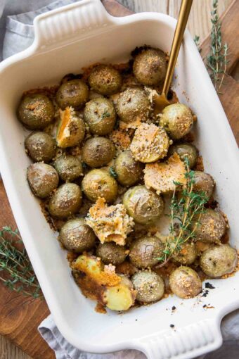 Crispy Garlic Parmesan Crusted Potatoes recipe in a baking dish.