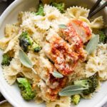 Garlic Parmesan Chicken Pasta in a bowl with forks.