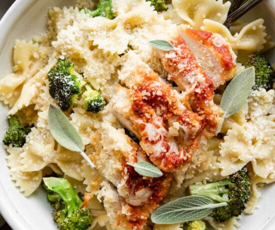 Garlic Parmesan Chicken Pasta in a bowl with forks.