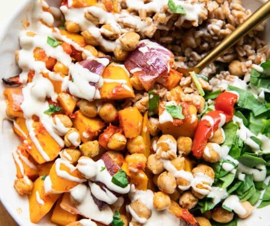 Harissa Veggie Bowls recipe with a fork and tahini drizzle!