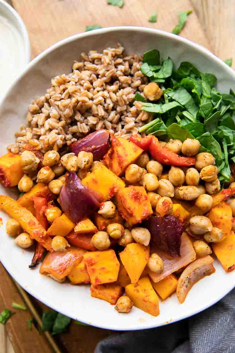 Harissa veggie bowl put together in a pan.